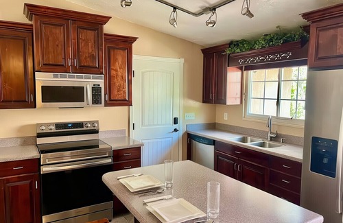 Millcreek House | Charming Mountain Retreat with Enclosed Backyard and Artistic Flair