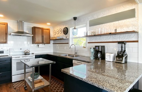 Brigands' Bay Cottage | Charming OBX soundfront beach box with hot tub, game room, and stunning sunsets!