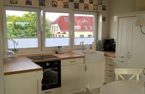 Norden Apartment | Charming old apartment with idyllic river views in the heart of Norden