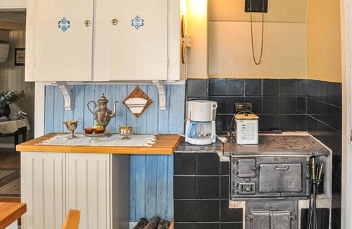 Svarta House | Charming old style house with quaint paintings from earlier times.
