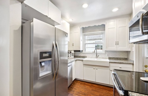 St. Louis Park House | Charming Pet-Friendly 2BR Duplex Haven