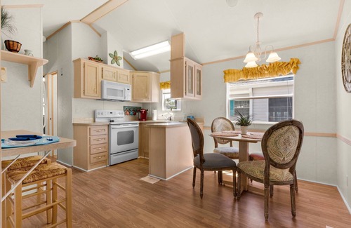Upper Grand Lagoon Cottage | Charming pet-friendly cottage in a gated resort with amenities on the east end of Panama City Beach!