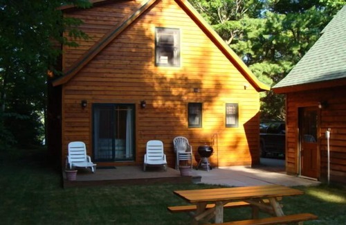 Cheboygan Cottage | Charming quality built home with private Mullett Lake beach access