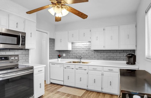 Highlands House | Charming Remodeled 3 Bedroom Home with Huge Yard Close to Parks and Shopping