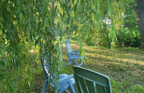 Graves-Saint-Amant Cottage | Charming Riverside Retreat: Cozy Cottage with Terrace, Garden & Wellness Services