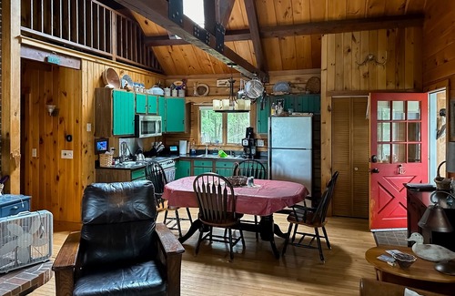 Wiscasset House | Charming riverfront home with cozy interiors, dock, and scenic deck views