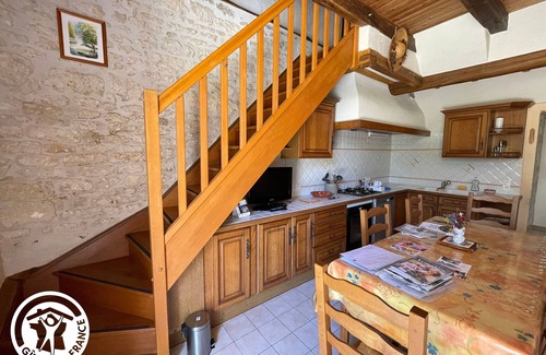 Damvix Cottage | Charming Riverside House with Canoes, Garden, and Nearby Market in Marais Poitevin