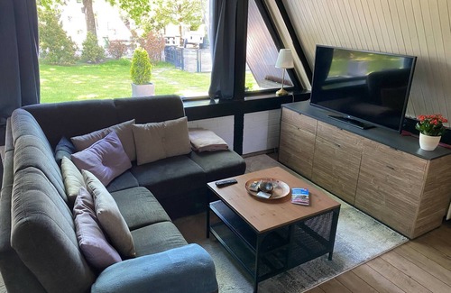 Schneverdingen House | Charming roof-only house in quiet surroundings