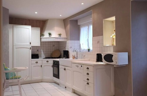 Saint-Germain-sur-Ay Cottage | Charming Stone House with Fireplace, Large Garden, and Car Charging in Coastal Village