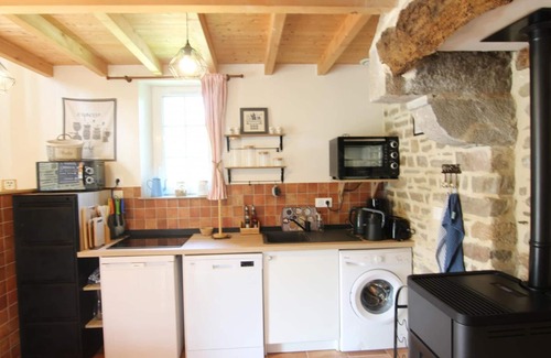 Annoville Cottage | Charming Stone Cottage Near Beach with Private Garden, Wi-Fi, and Pet-Friendly