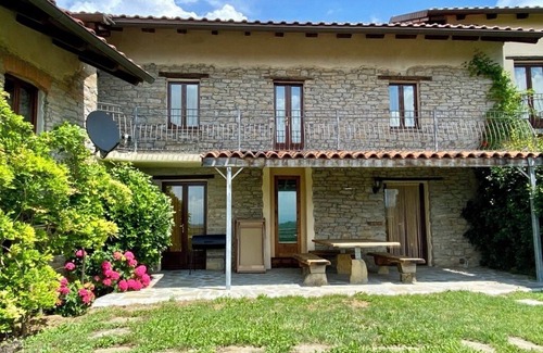 Mombarcaro Cottage | charming stone villa with swim lake and tennis court