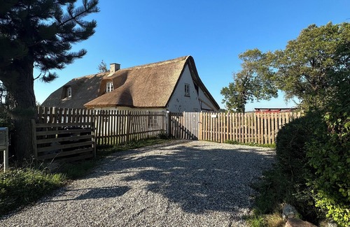 Nakskov House | Charming summer house with thatched roof and large garden. Pet friendly!