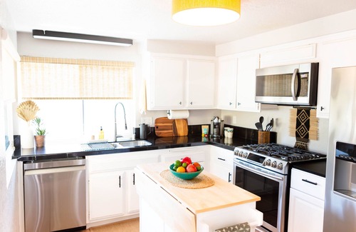 San Carlos House | Charming Townhome in the 'Jewel of San Diego Hills' with hot tub, pool, and gym!
