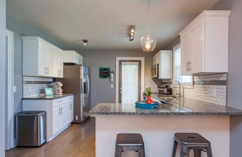 Woodbine House | Charming townhome less than 4 miles to Downtown! Unit A