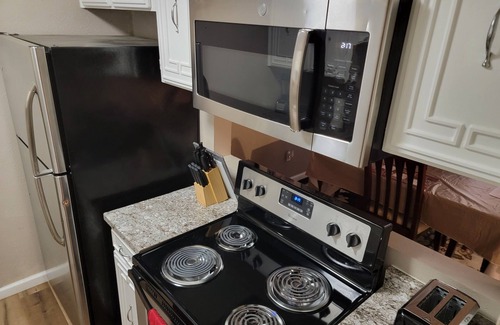 South Arlington House | Charming townhome with free parking on premises