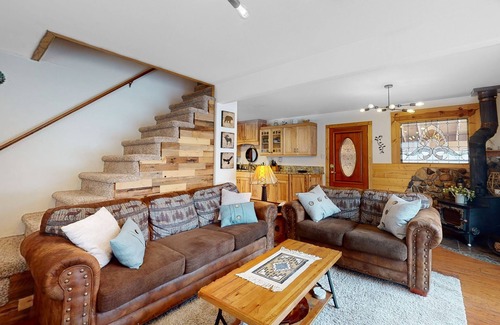 Tahoe Paradise House | Charming two-story cabin with a private hot tub, patio, & large backyard