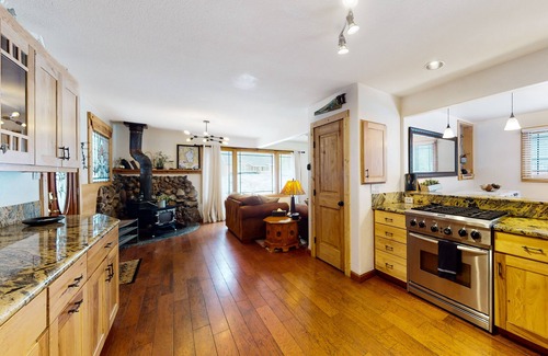 Tahoe Paradise House | Charming two-story cabin with a private hot tub, patio, & large backyard