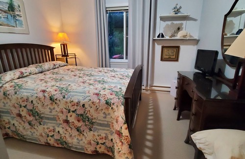 Cowichan Bay Bed & Breakfast | Charming walkout basement patio suite - ocean views.