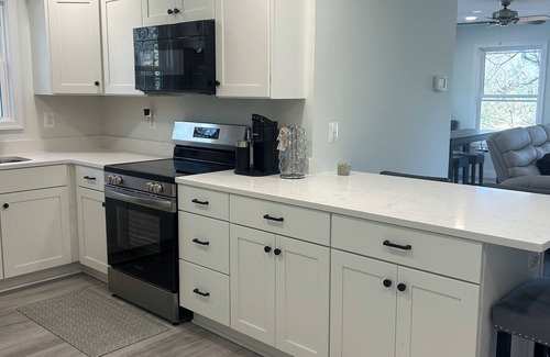 Calvert Beach-Long Beach Apartment | Charming water view 2-bedroom apartment with beach access in Saint Leonard