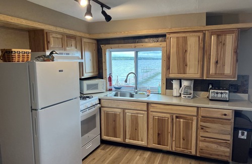 Indian River Cottage | Charming Waterfront Cottage on Mullett Lake