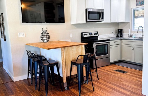 Graford House | Charming waterfront retreat on PK, boat slip included, & beach swimming area