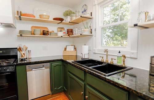 Edwardsville Cottage | Charming Waterfront 3-Bedroom Cottage with Hot Tub, Kayaks, Workspace, Fishing