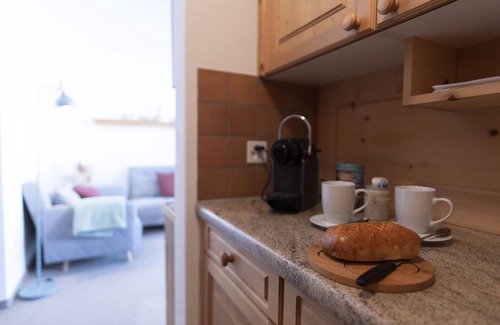 Vulpera Apartment | Chasa Grusaida: Charming, cosy 2-room flat with balcony near the golf course