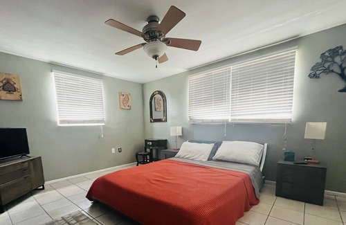 New Port Richey House | Cheerful 2 bedroom. Great patio spaces.