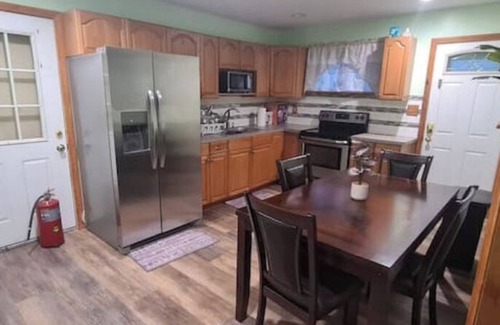 Copiague House | Cheerful 2-Bedroom Home With On Premises Parking