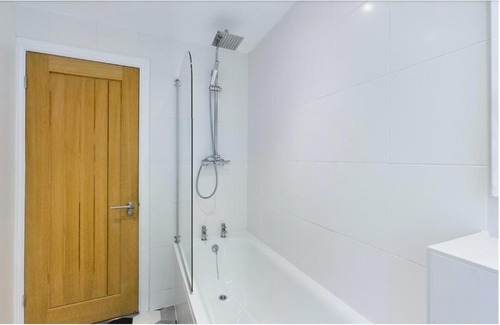 Hazlerigg Apartment | Cheerful 2 - bedroom home with free parking.
