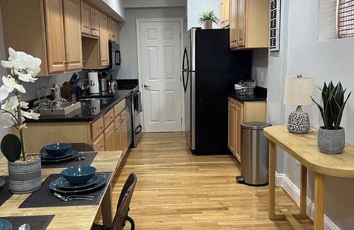 Canton House | Cheerful 2-bedroom row house with rooftop deck!