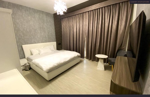 Al Hamra Village Villa | Cheerful 4-bedroom Villa with pool and BBQ area