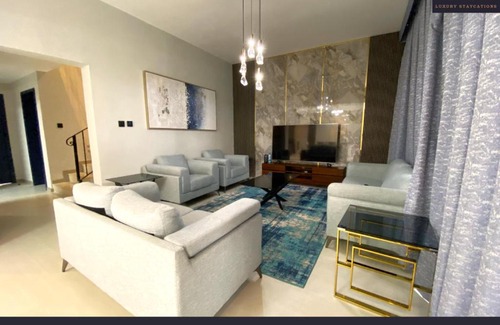 Al Hamra Village Villa | Cheerful 4-bedroom Villa with pool and BBQ area