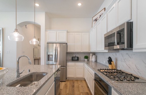 Magnolia House | Cheerful 4-bedroom home with patio!
