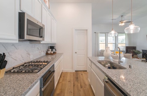 Magnolia House | Cheerful 4-bedroom home with patio!