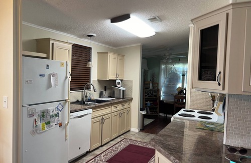 Barefoot Bay House | Cheerful Barefoot Bay vacation rental
