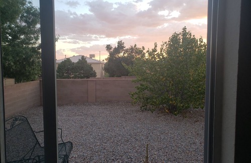 Westside House | Cheerful NM style home with indoor fireplace
