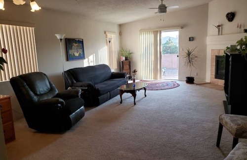 Westside House | Cheerful NM style home with indoor fireplace