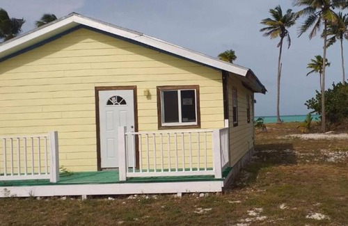 Mars Bay Settlement Villa | Cheerful one bedroom villa with a patio.