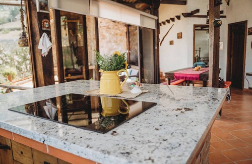 Paute House | Cheerful rustic house, gorgeously mountain landscaping