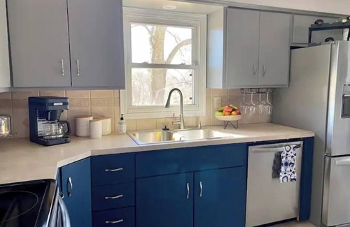 Council Bluffs House | Cheerful two bedroom home in quiet neighborhood. Sun Porch ~ Patio ~ Large yard