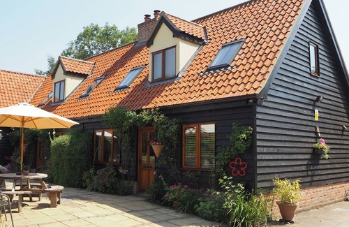 Bungay Cottage | CHESTNUT TREE BARNS: CEDAR COTTAGE, pet friendly in Bungay