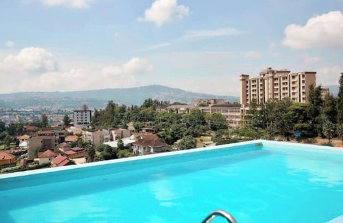 Kigali Apartment | Chic 1-bedroom apartment with AC, Swimming pool,fitness room in wonderful Kigali