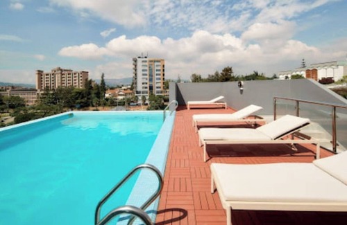 Kigali Apartment | Chic 1-bedroom apartment with AC, Swimming pool,fitness room in wonderful Kigali