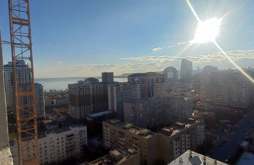 Baku Apartment | Chic 1-bedroom apartment with WiFi, AC in vibrant Bakı