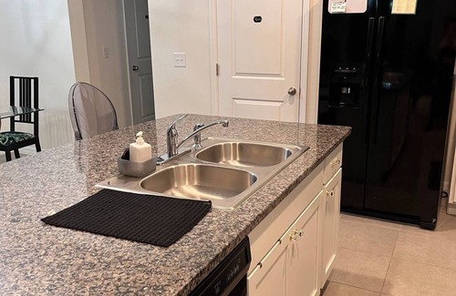 Bloomingdale House | Chic 2-bed 1.5-bath townhouse in a secure community, adventures await nearby!n