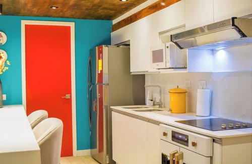 Zona 4 Apartment | Chic and Modern 9th floor 2B/2B Apt in Downtown