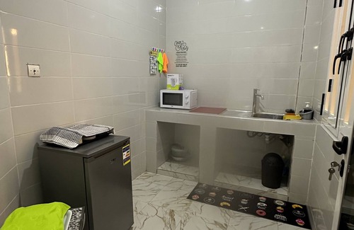 Point E Apartment | Chic apartment with a cute little garden. 30 minutes from the AIBD airport