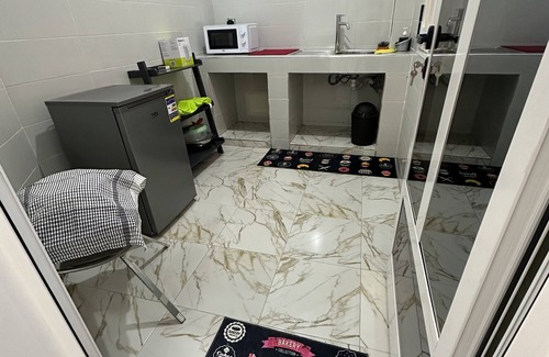 Point E Apartment | Chic apartment with a cute little garden. 30 minutes from the AIBD airport