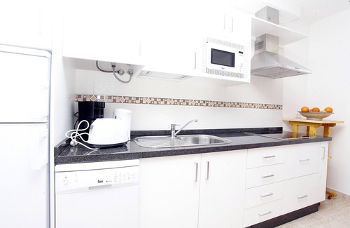 El Cotillo Apartment | Chic apartment with sea views on a sandy beach, large roof terrace and WiFi